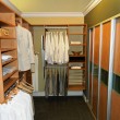 This closet makes great use of such a small space - reach in and open shelving!