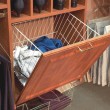 Keep your laundry out of sight with this retractable hamper!