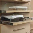 We love these glass shelves becuase you can see twhat's inside before you pull out the drawer!